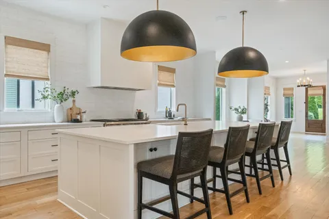 a table and chairs in a kitchen