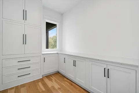a view of a closet in kitchen