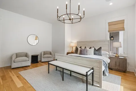 a bedroom with furniture and a bed