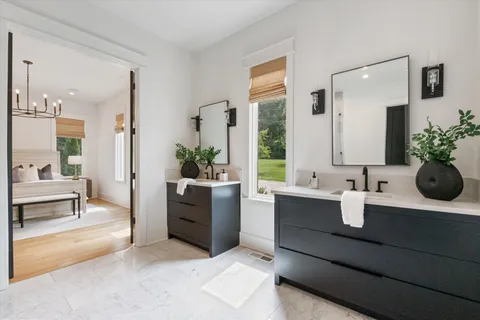 a view of living room kitchen with furniture and stove