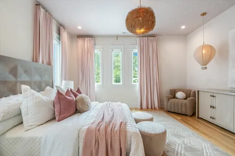 a kitchen with white cabinets and a sink