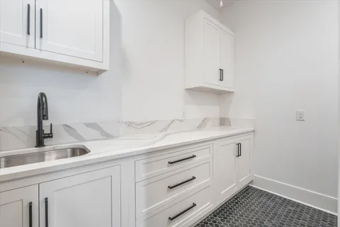 a bathroom with a sink toilet and bathtub