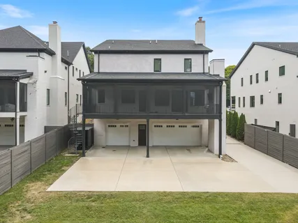 a couple of table and chairs in a yard