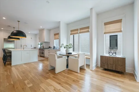 a kitchen with a cabinets and window