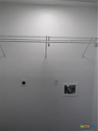 a view of a room with racks on the wall