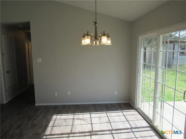 a view of a livingroom with a chandelier