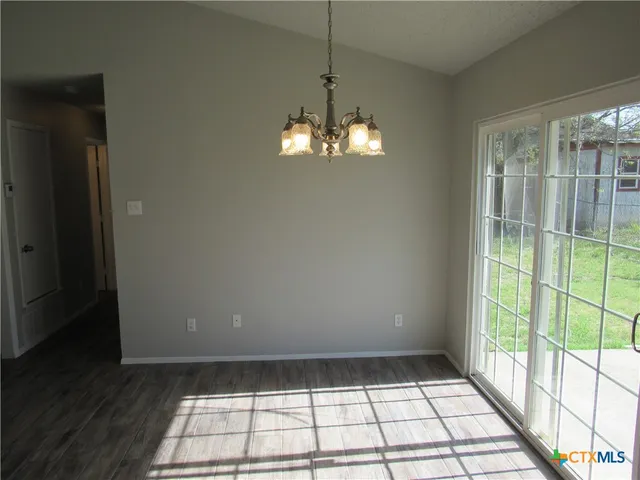 a view of a livingroom with a chandelier