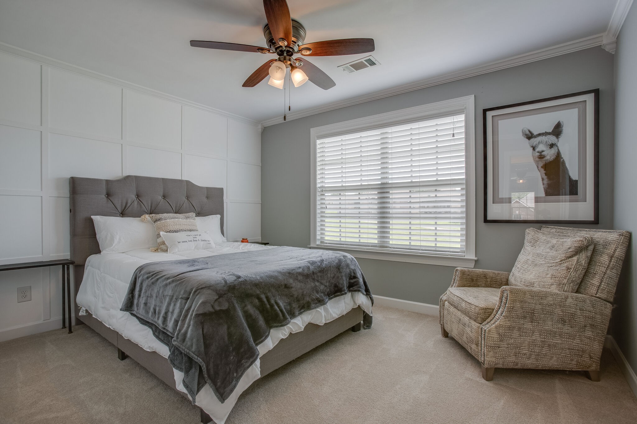 1073 Golf View Way Spring Hill, TN 37174 - Photo 27 of 34 a spacious bedroom with a bed and couch