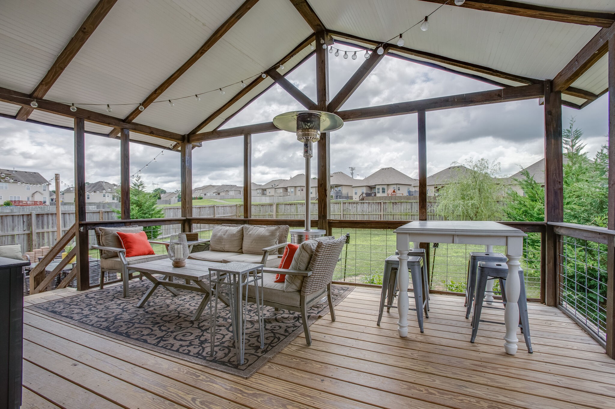 1073 Golf View Way Spring Hill, TN 37174 - Photo 29 of 34 a living room with large windows and furniture