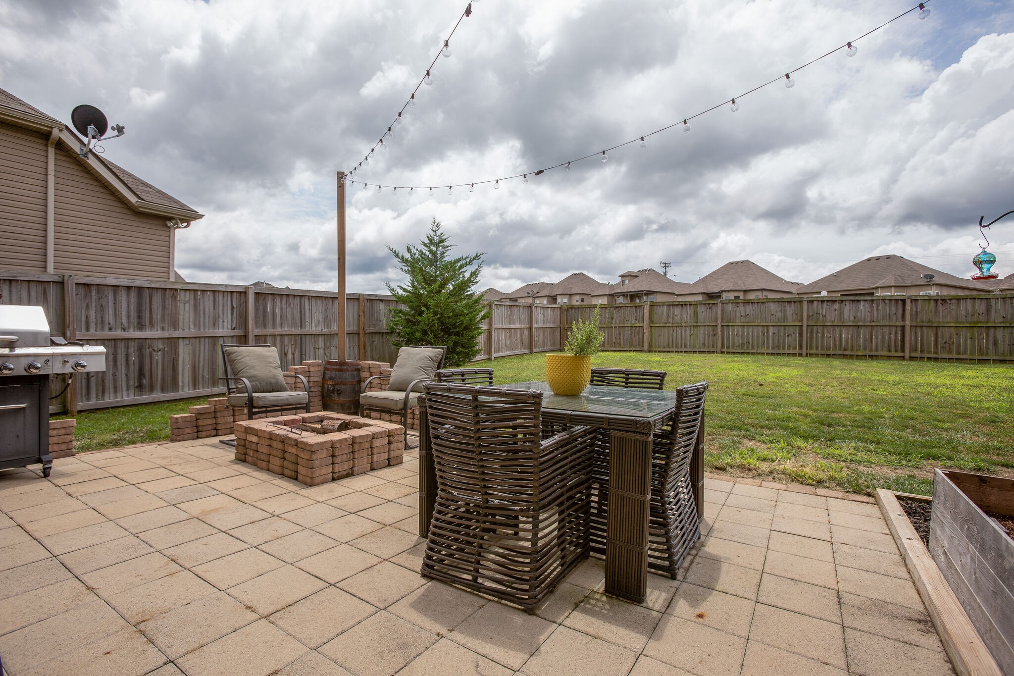 1073 Golf View Way Spring Hill, TN 37174 - Photo 31 of 34 a view of a terrace with furniture and garden
