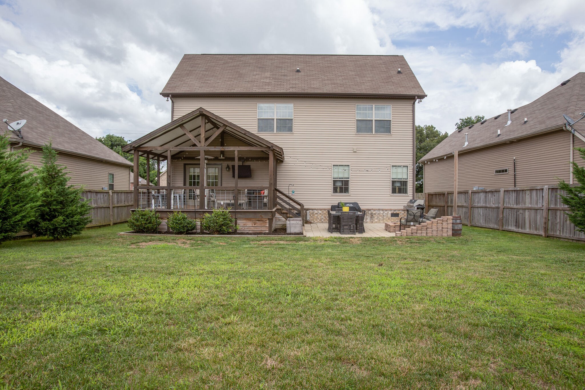 1073 Golf View Way Spring Hill, TN 37174 - Photo 34 of 34 a front view of a house with garden