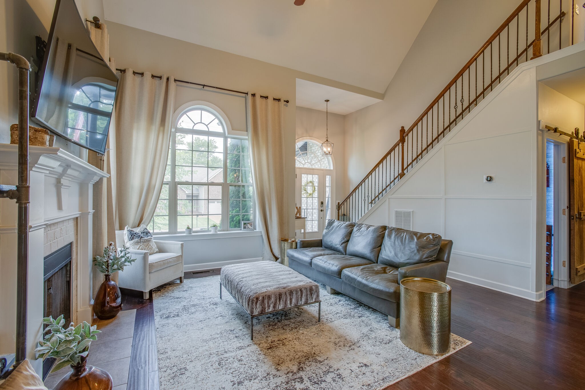 1073 Golf View Way Spring Hill, TN 37174 - Photo 6 of 34 a living room with furniture and a fireplace