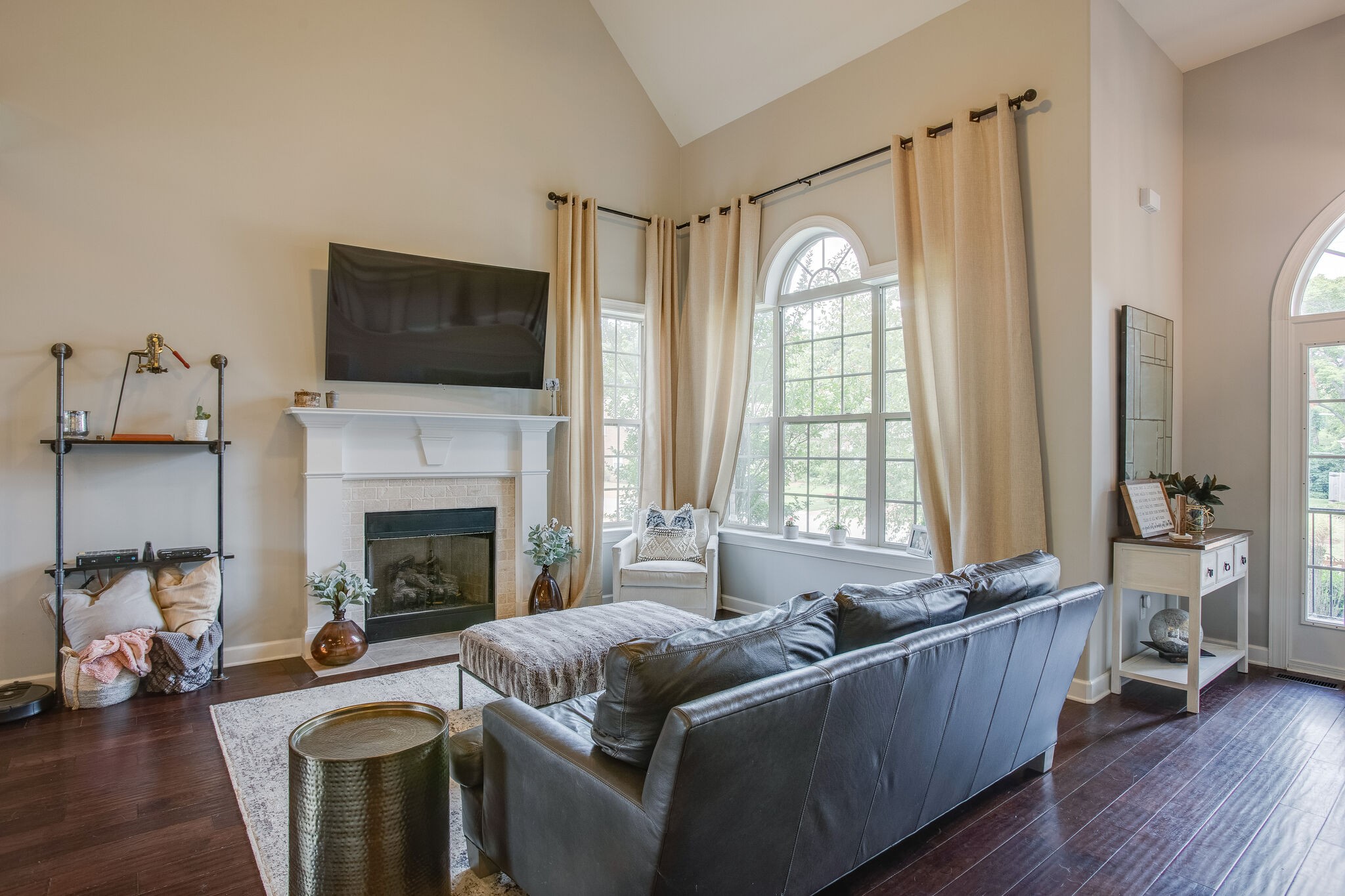 1073 Golf View Way Spring Hill, TN 37174 - Photo 7 of 34 a living room with furniture fireplace and flat screen tv
