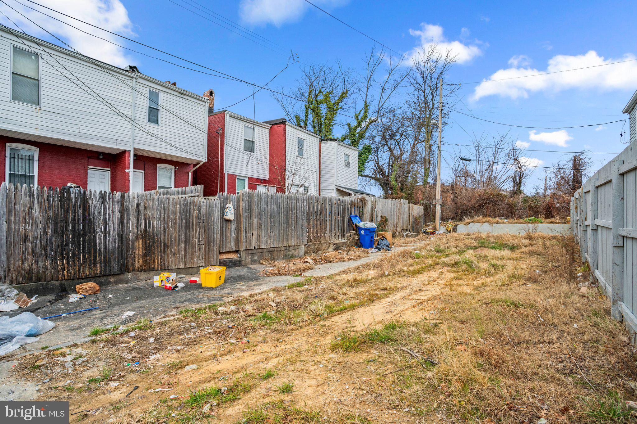 500 East 26th Street Baltimore, MD 21218 - Photo 5 of 7 a view of a backyard with a tree
