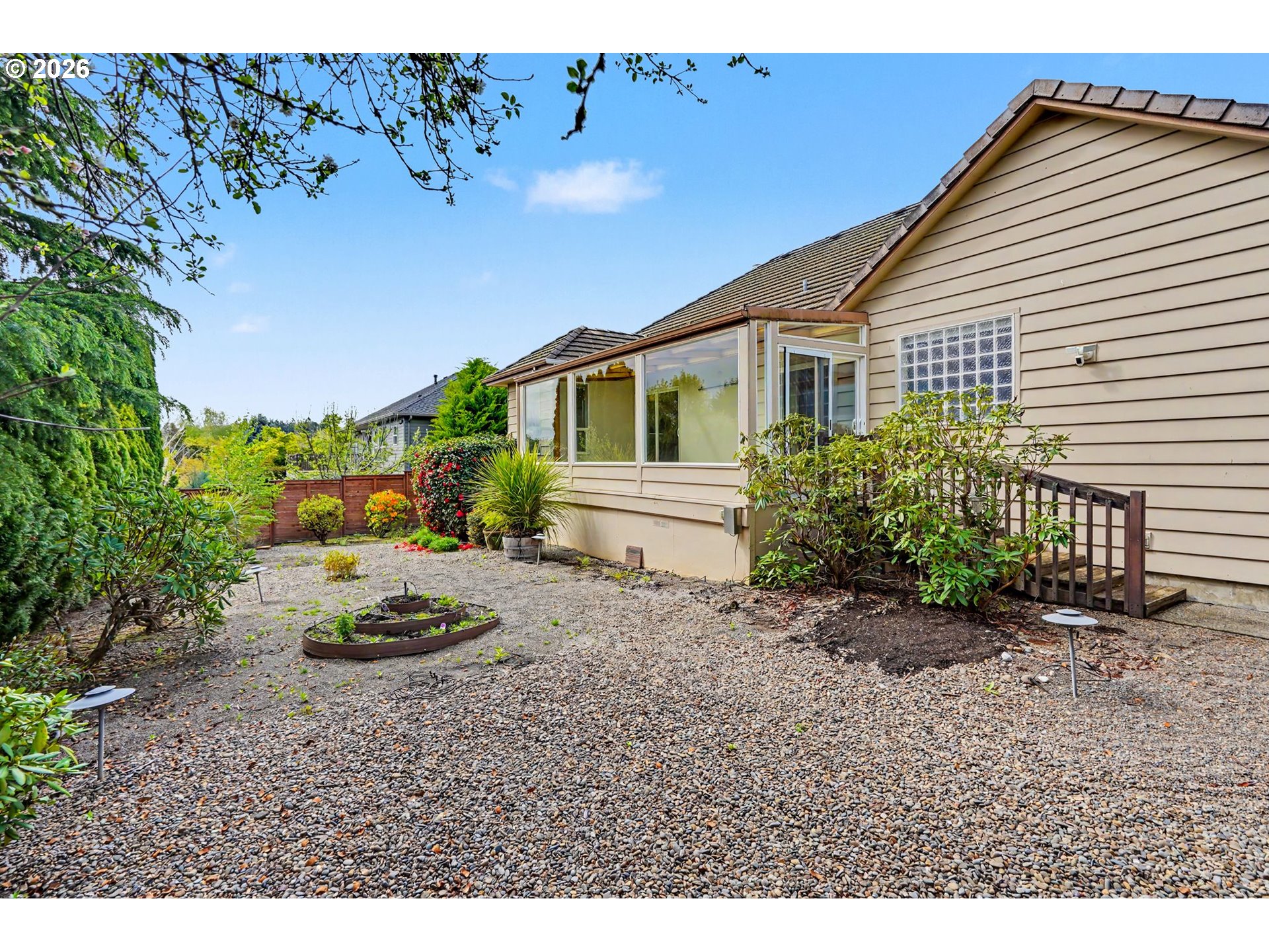 1470 Ranier Loop Northwest Salem, OR 97304 - Photo 47 of 48 a view of a house with a garden