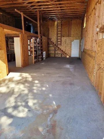 a view of empty room with closet