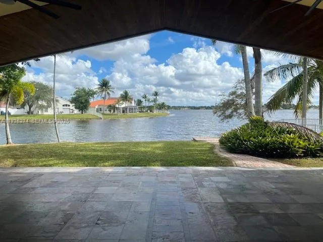 a view of a lake with a big yard