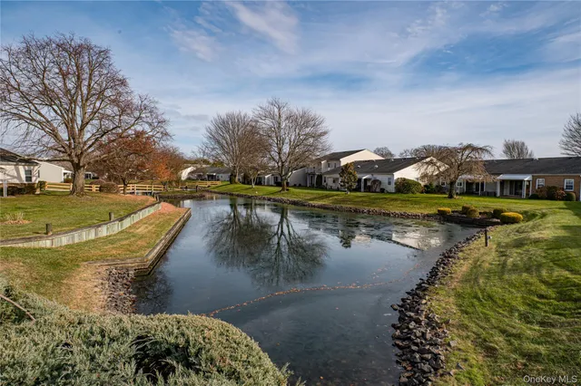 a view of a lake with houses