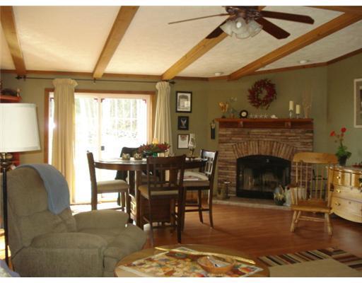 32 Pitcher Road Belfast, ME 04915 - Photo 3 of 24 Living Room. Beautiful wood burning...