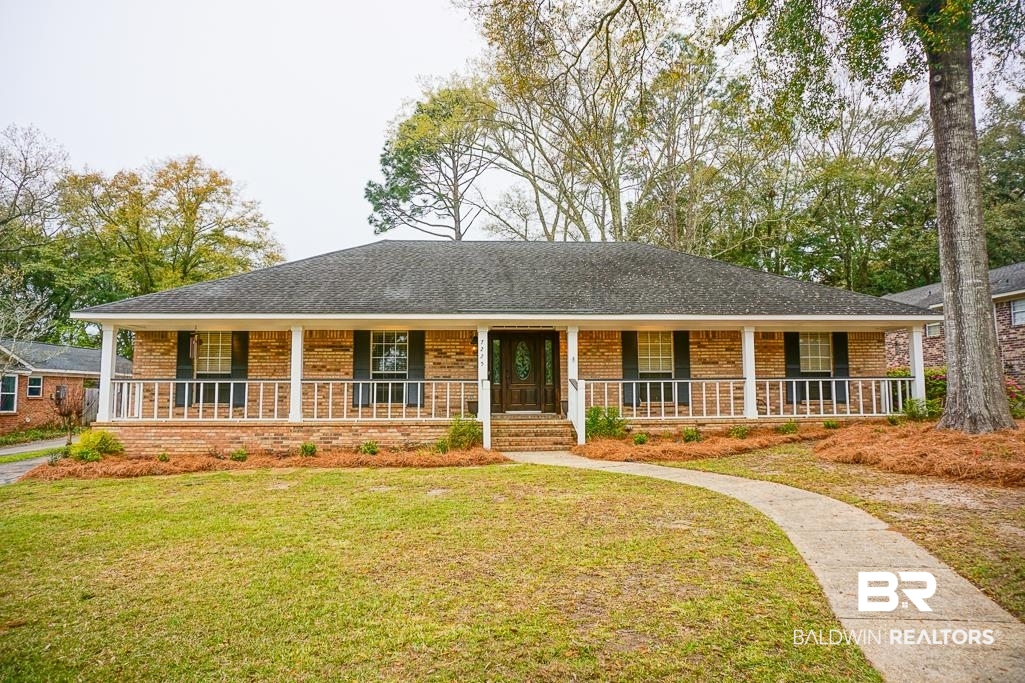 7225 Smithfield Road East Mobile, AL 36695 - Photo 1 of 27 Ranch-style home with brick siding, a porch, and a front lawn