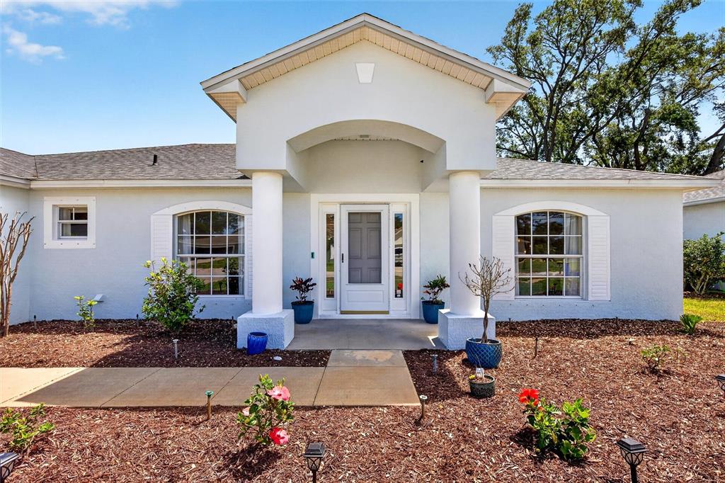 341 Mariners Gate Drive Edgewater, FL 32141 - Photo 3 of 53 a front view of a house