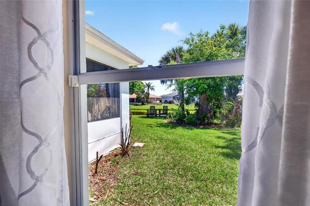 341 Mariners Gate Drive Edgewater, FL 32141 - Photo 33 of 53 a view of a back yard from a window