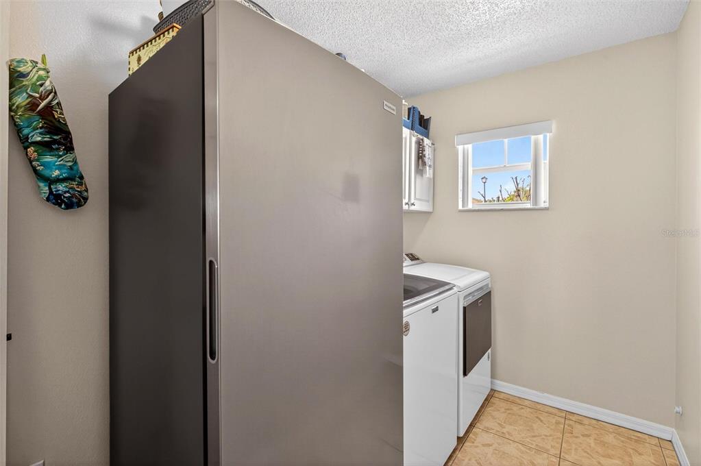 341 Mariners Gate Drive Edgewater, FL 32141 - Photo 34 of 53 a view of a storage & utility room with a window