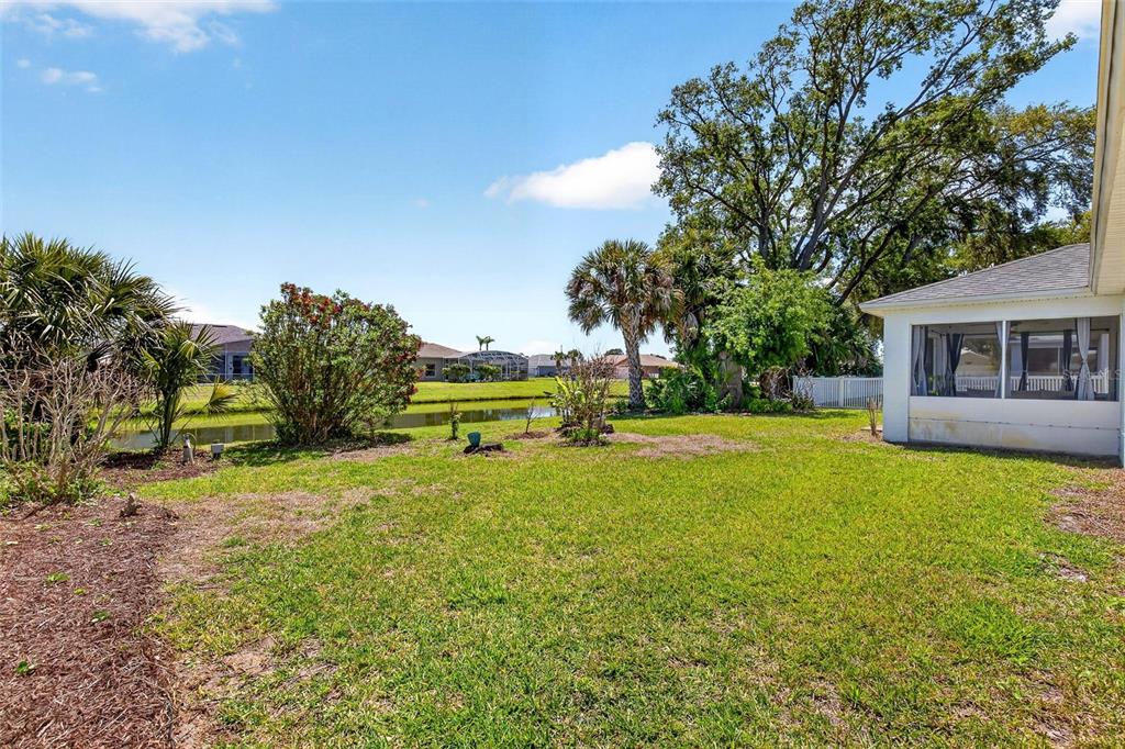 341 Mariners Gate Drive Edgewater, FL 32141 - Photo 39 of 53 a view of backyard of house with green space