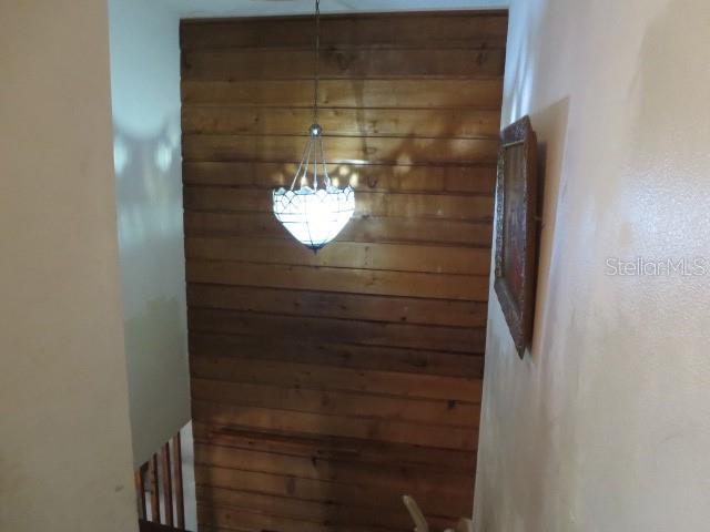 370 Race Track Road South Oldsmar, FL 34677 - Photo 13 of 33 Stairwell with wood accent wall.