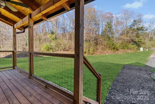 a view of outdoor space with wooden deck