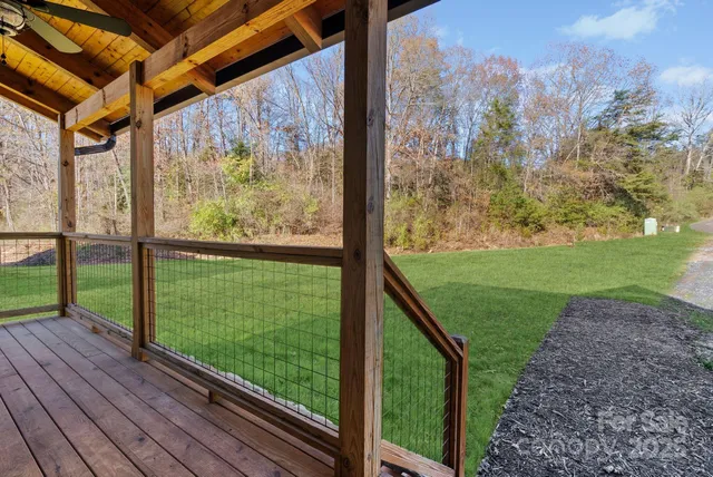 a view of outdoor space with wooden deck