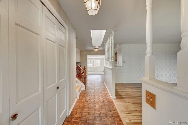 a view of livingroom with hardwood floor and a ceiling fan