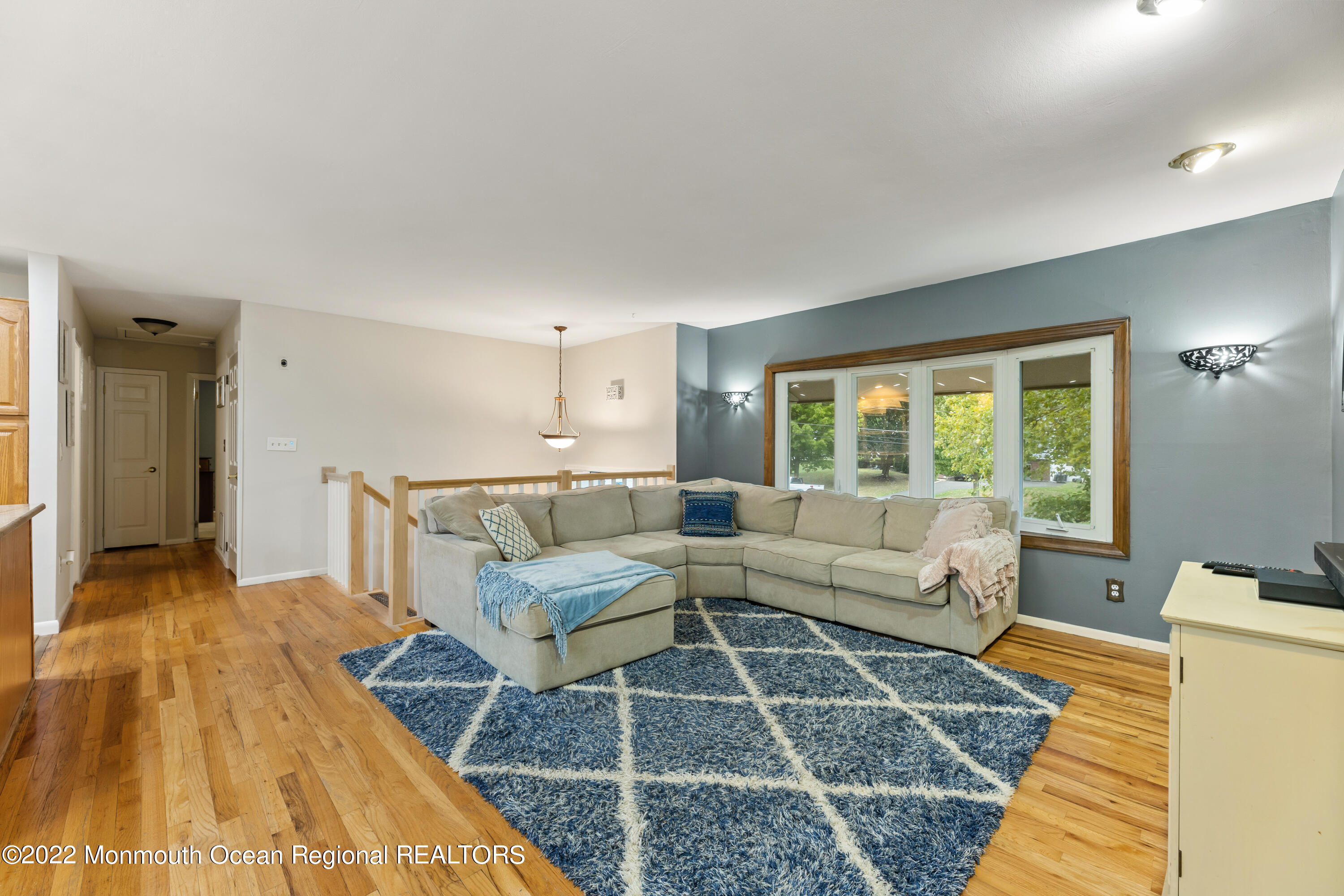 21 Holiday Road Manalapan, NJ 07726 - Photo 11 of 30 a living room with furniture and a rug