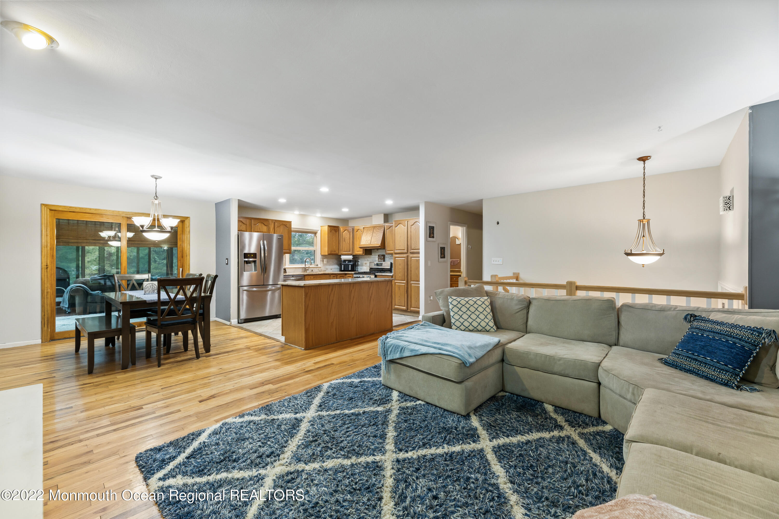 21 Holiday Road Manalapan, NJ 07726 - Photo 12 of 30 a living room with furniture and kitchen view