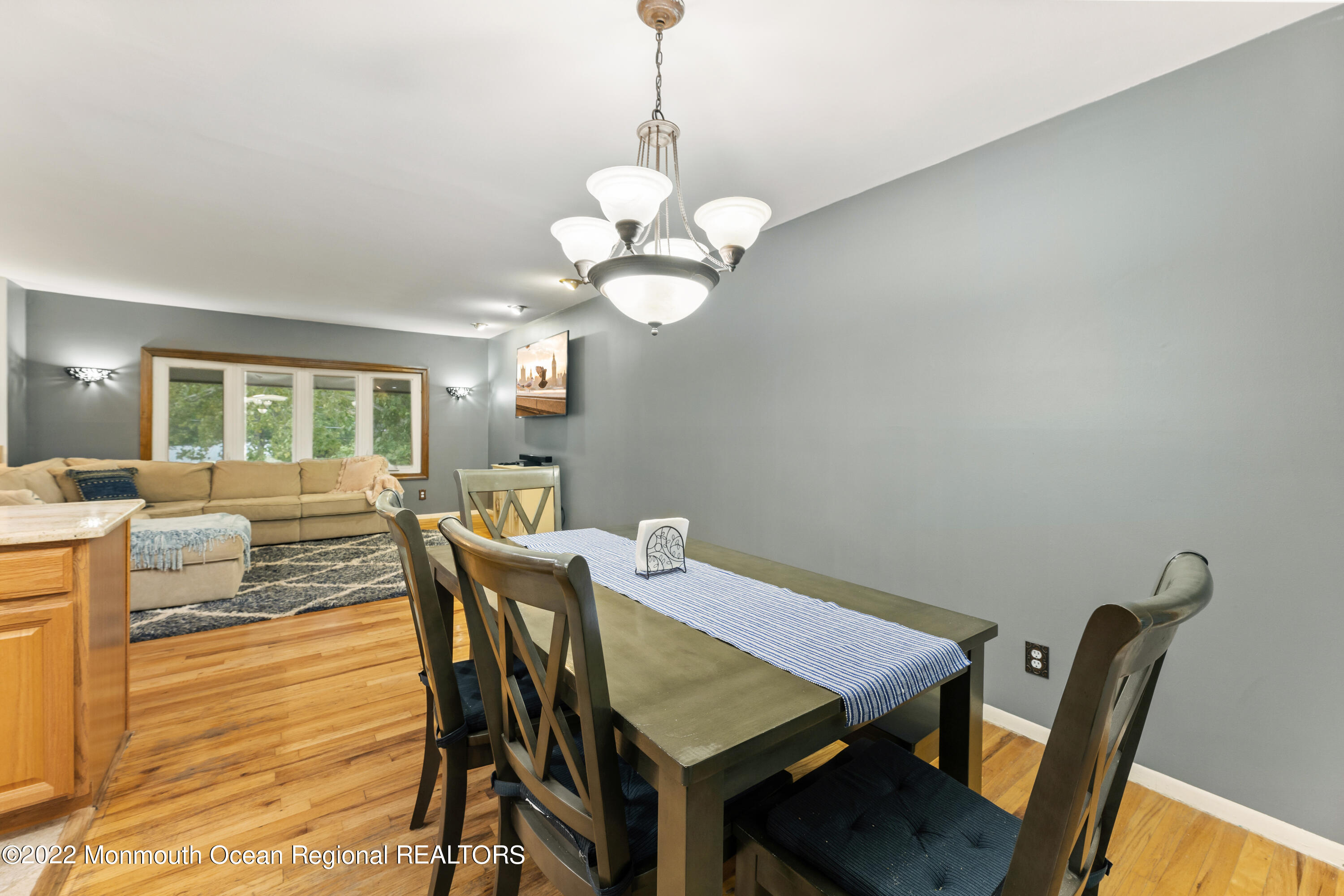 21 Holiday Road Manalapan, NJ 07726 - Photo 14 of 30 a view of a dining room with furniture window and wooden floor