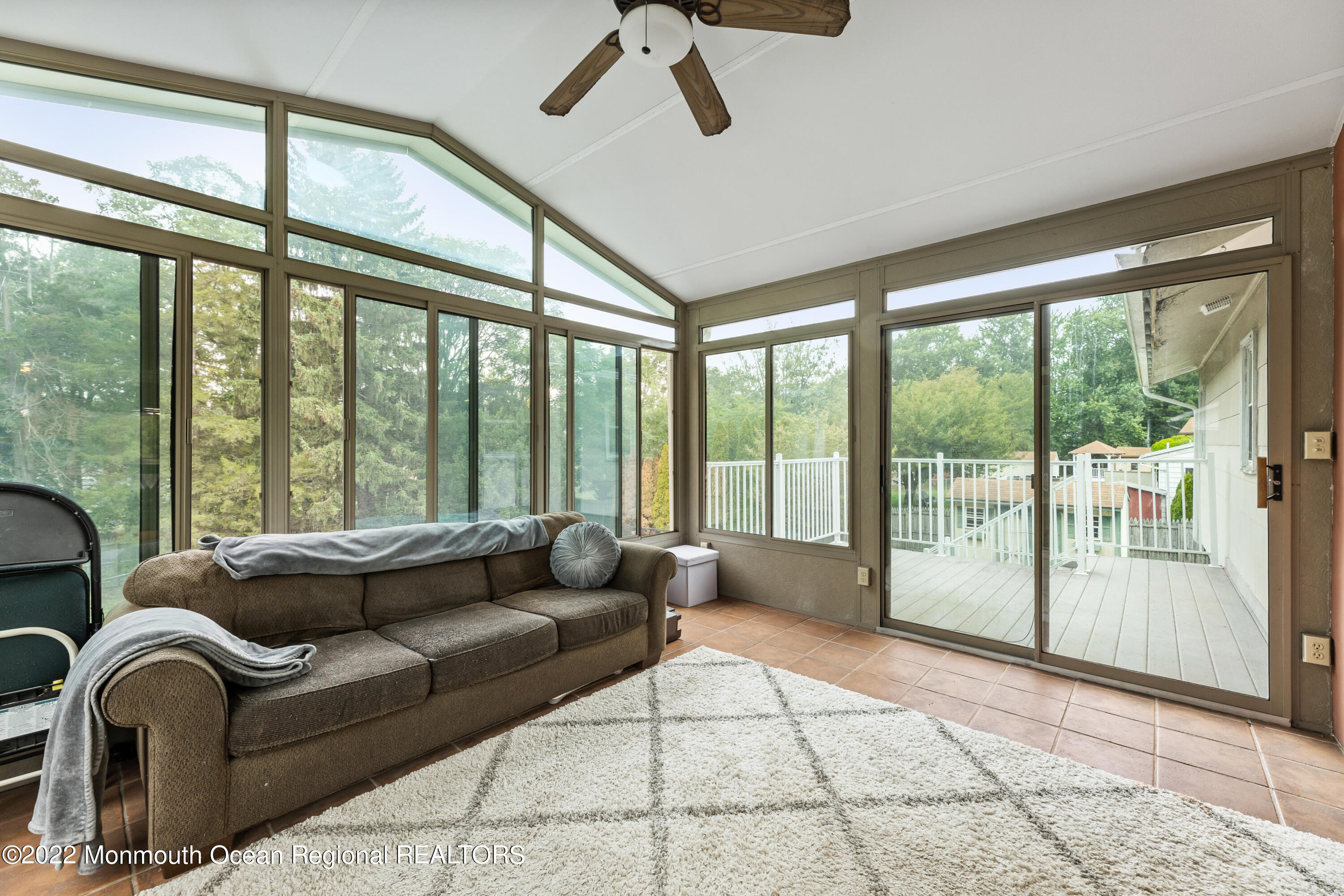 21 Holiday Road Manalapan, NJ 07726 - Photo 18 of 30 a living room with furniture and a large window