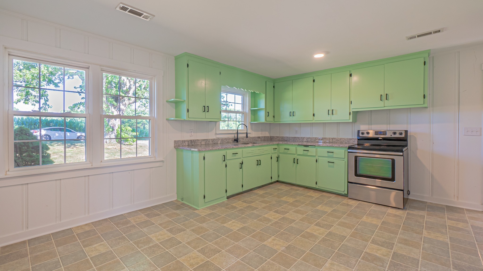 299 Piper Road Portland, TN 37148 - Photo 14 of 34 a kitchen with a sink cabinets and window