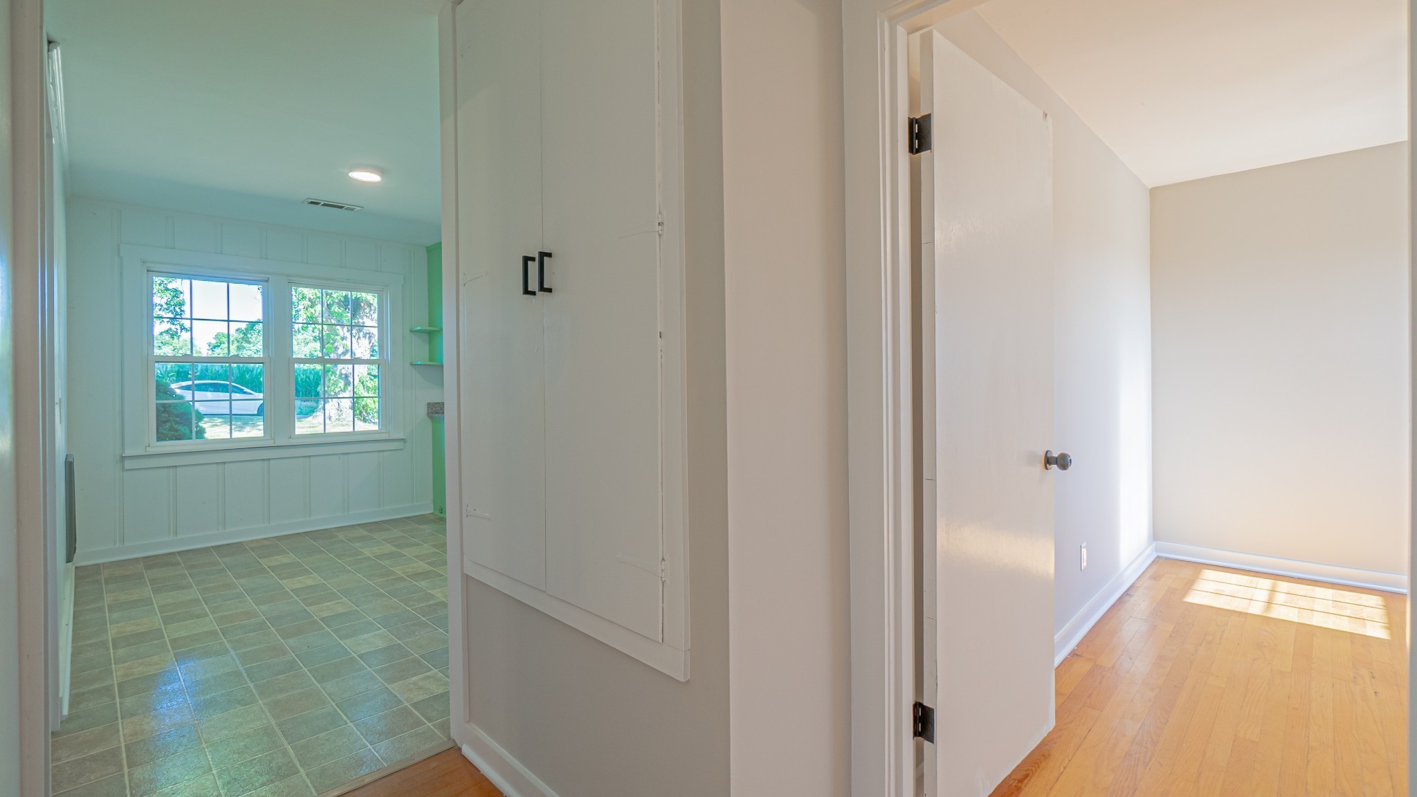 299 Piper Road Portland, TN 37148 - Photo 19 of 34 a view of a hallway with wooden floor and closet