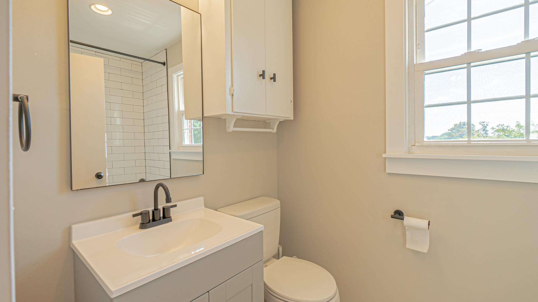299 Piper Road Portland, TN 37148 - Photo 22 of 34 a bathroom with a sink a toilet and a mirror