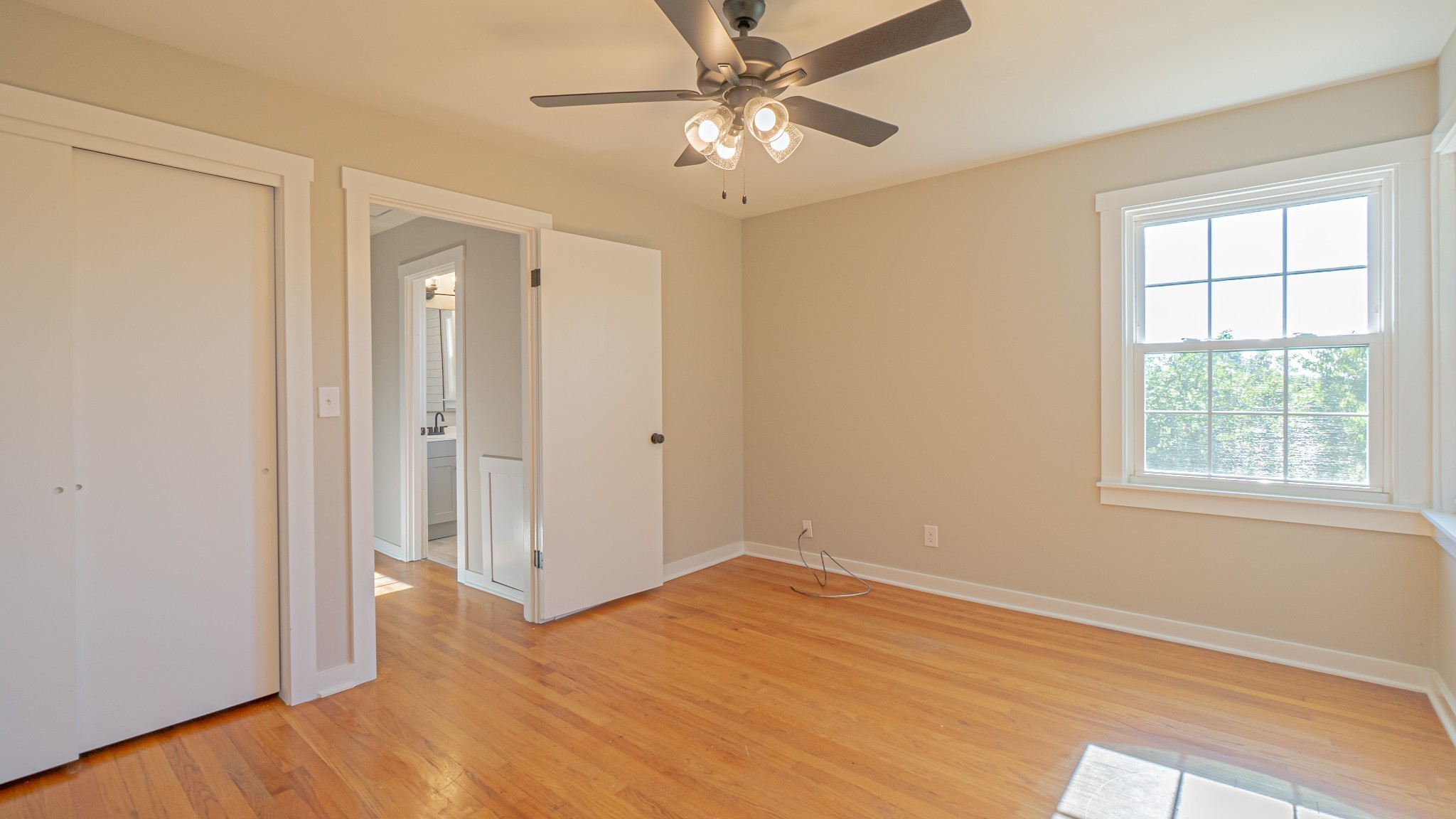 299 Piper Road Portland, TN 37148 - Photo 25 of 34 a view of empty room with wooden floor and fan