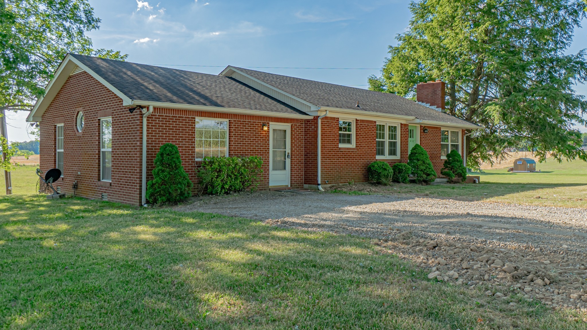 299 Piper Road Portland, TN 37148 - Photo 5 of 34 a front view of a house with garden