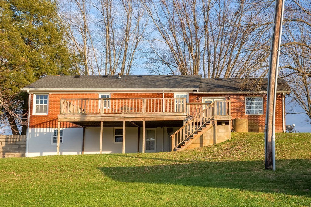 299 Piper Road Portland, TN 37148 - Photo 6 of 34 a view of a house with backyard porch and sitting area