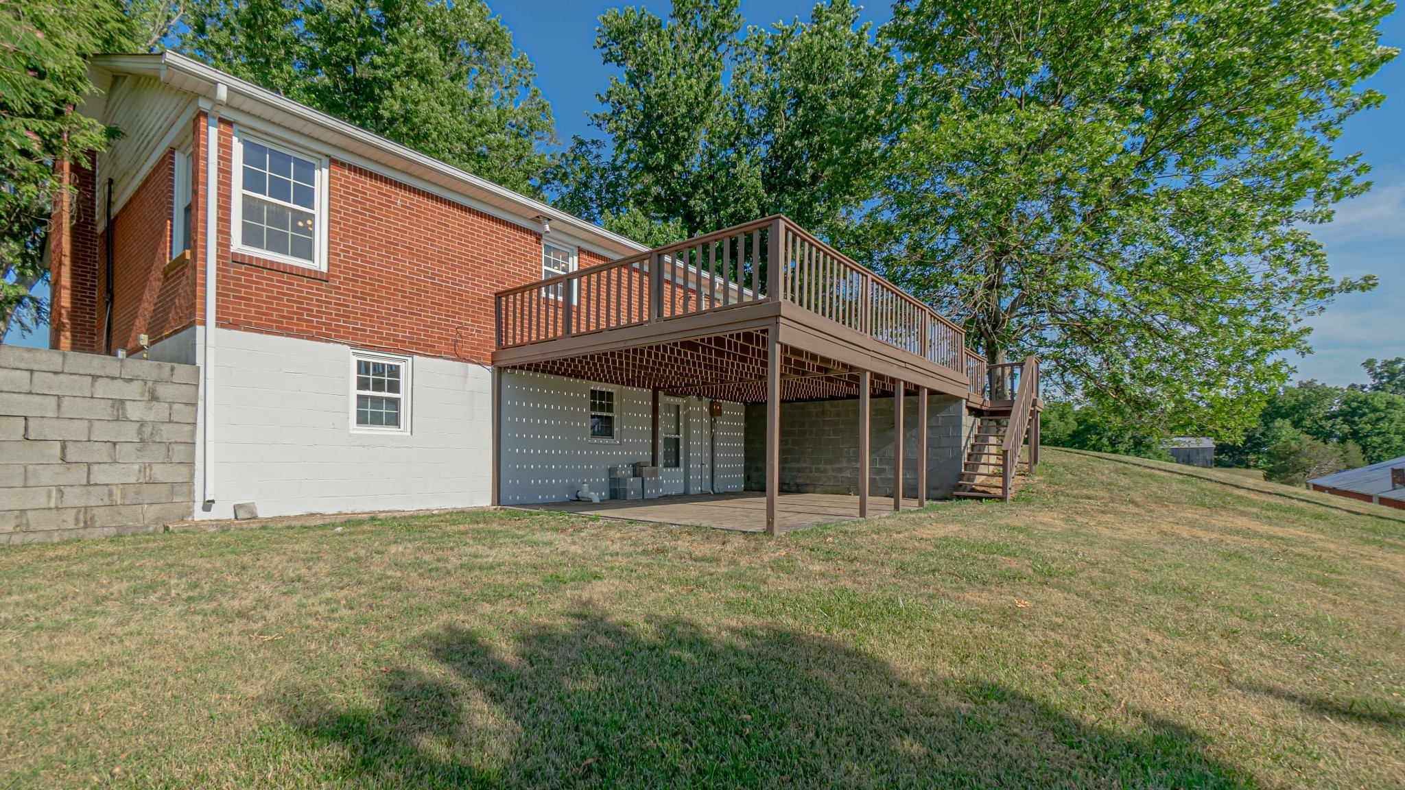 299 Piper Road Portland, TN 37148 - Photo 7 of 34 a front view of a house with a garden