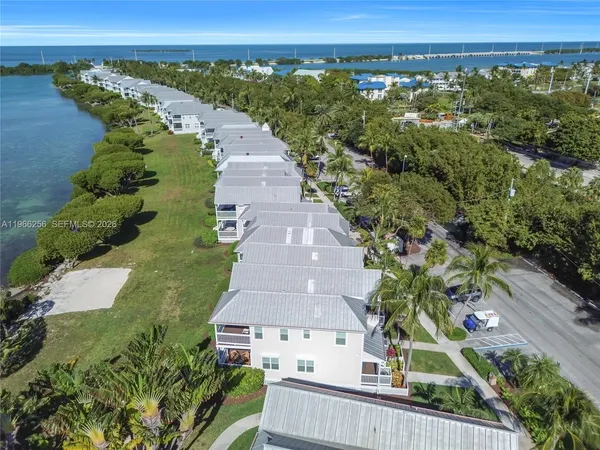 a view of a city with an ocean