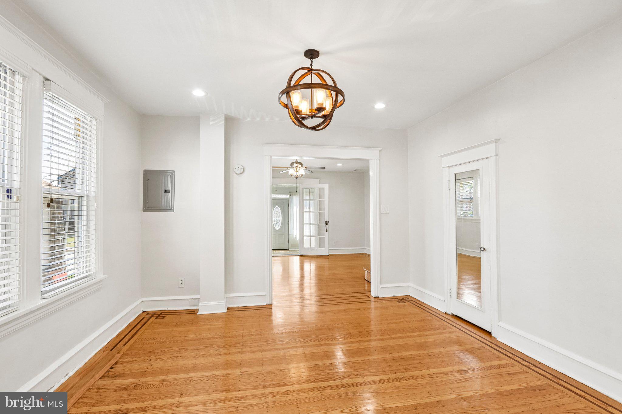 7407 Rogers Avenue Upper Darby, PA 19082 - Photo 12 of 50 a view of an entryway with wooden floor and door