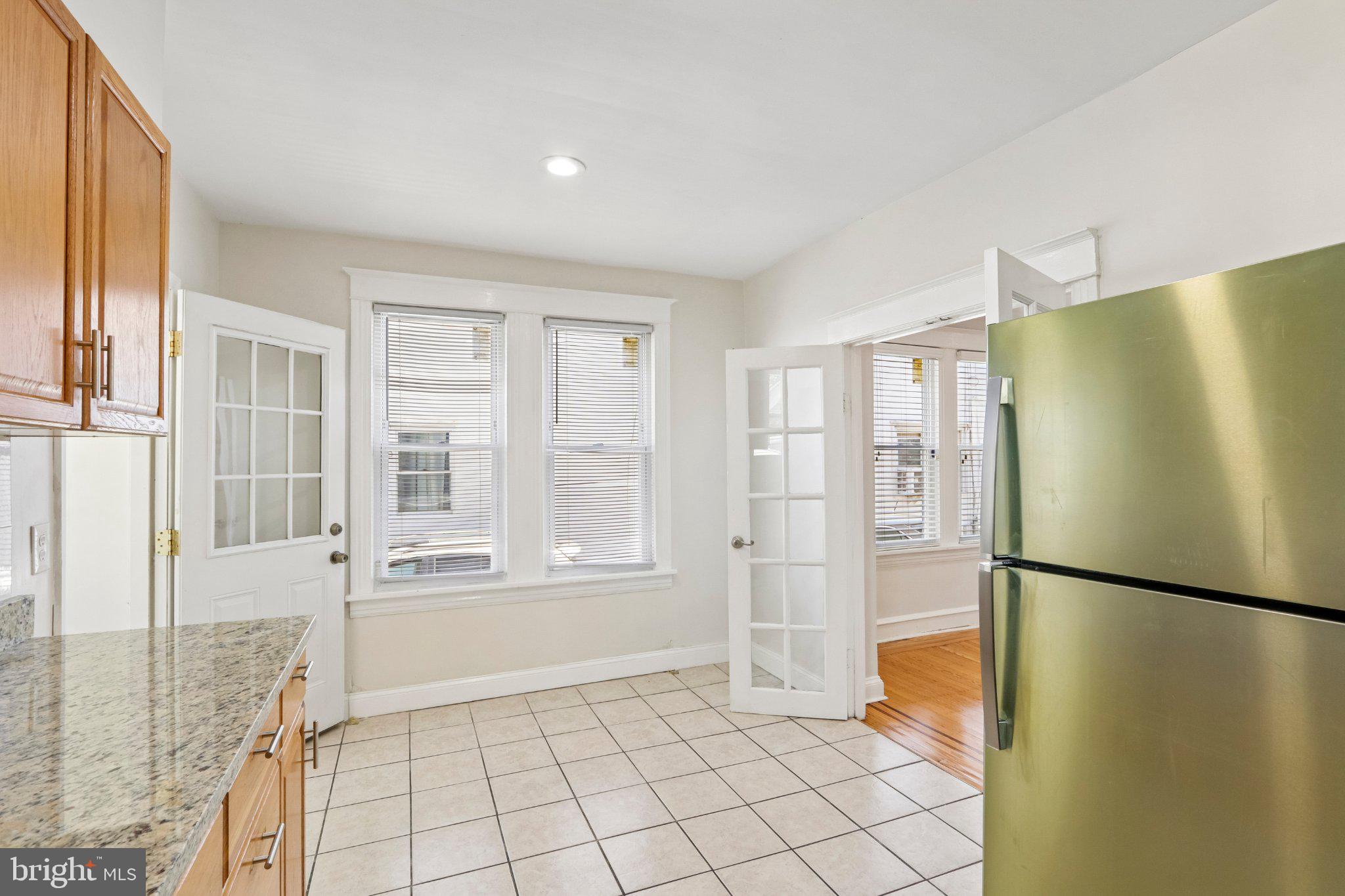 7407 Rogers Avenue Upper Darby, PA 19082 - Photo 16 of 50 a view of an empty room with a fireplace