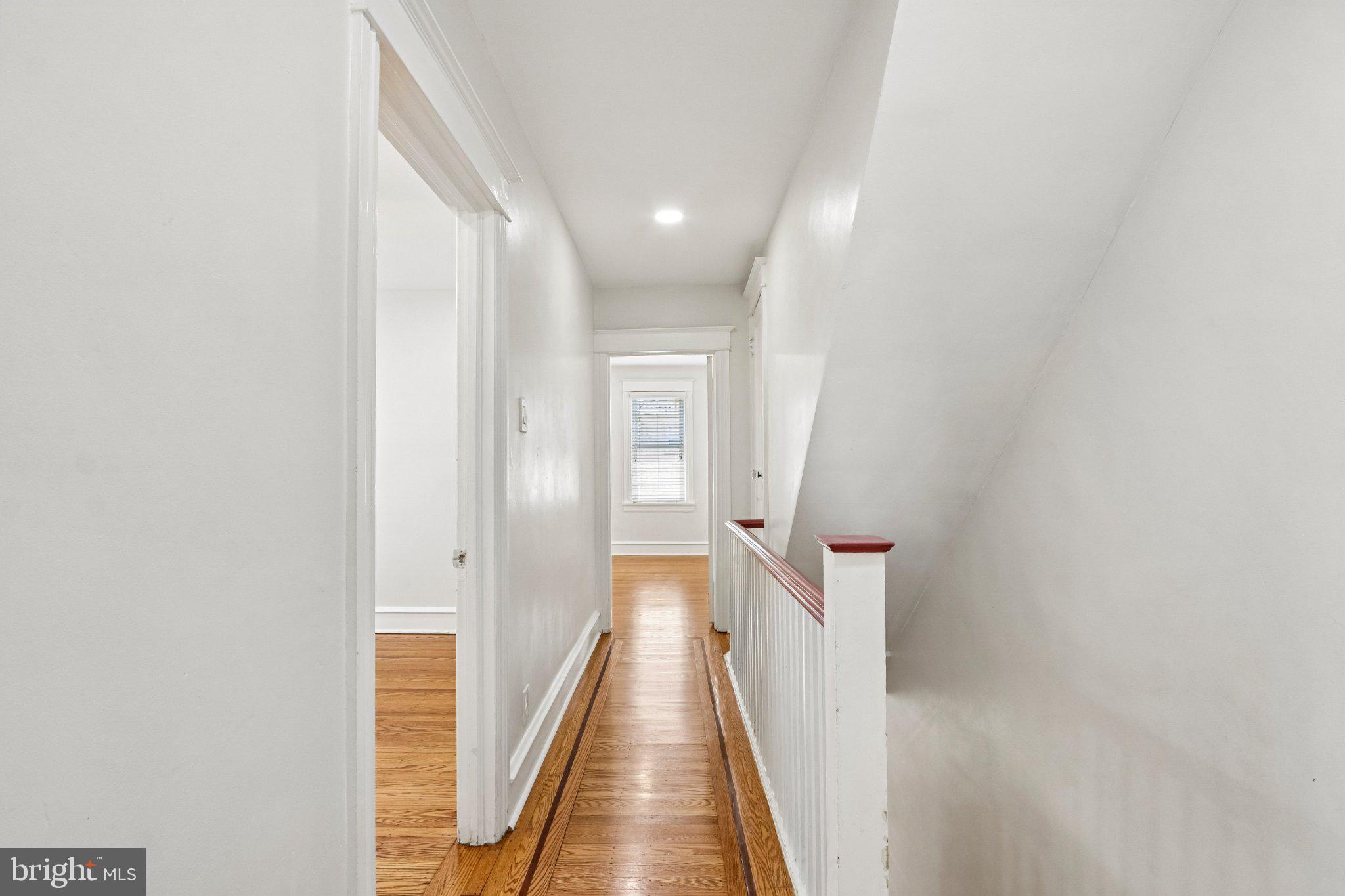 7407 Rogers Avenue Upper Darby, PA 19082 - Photo 23 of 50 a view of a hallway with a white walls