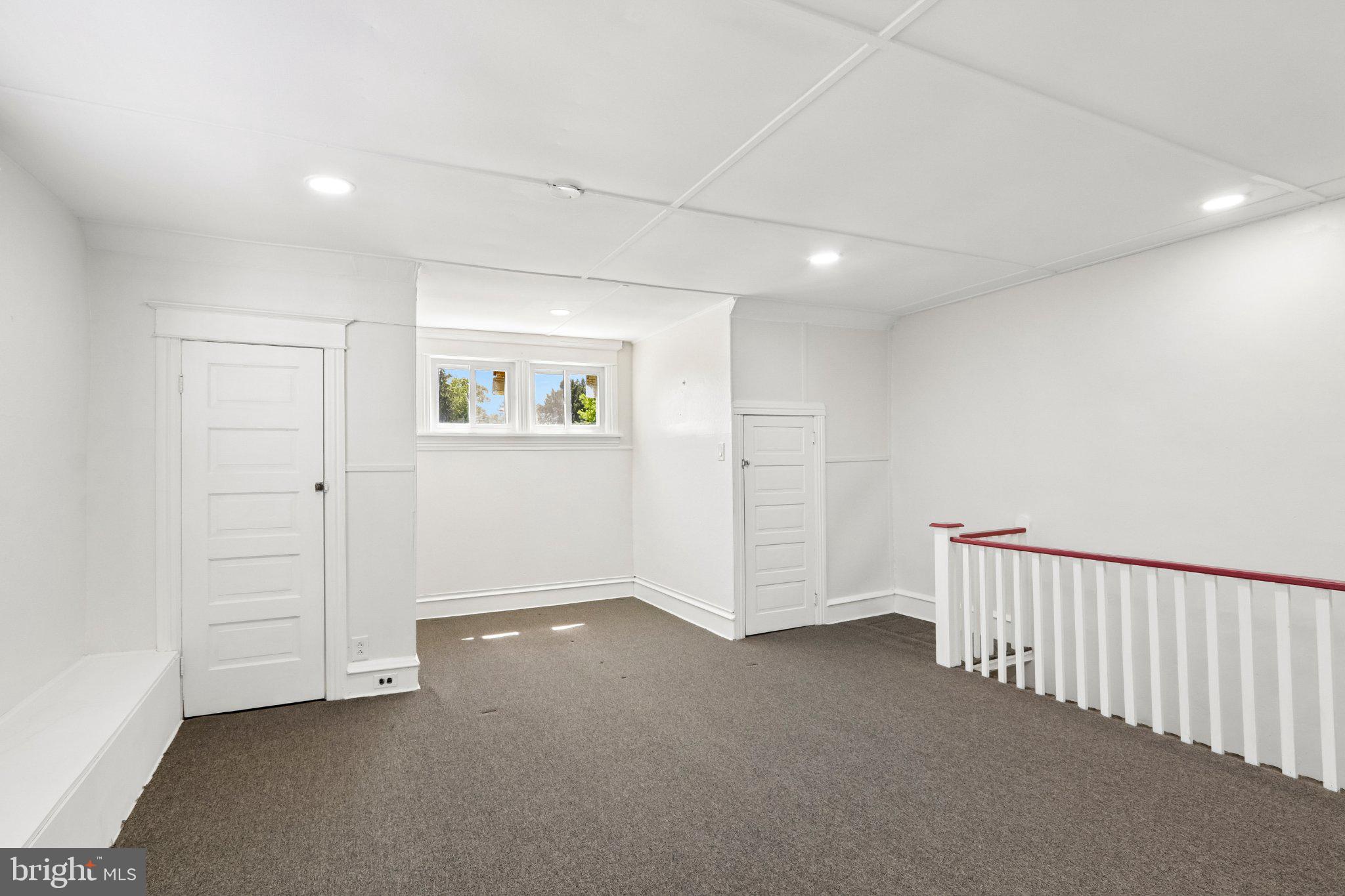 7407 Rogers Avenue Upper Darby, PA 19082 - Photo 36 of 50 an empty room with windows