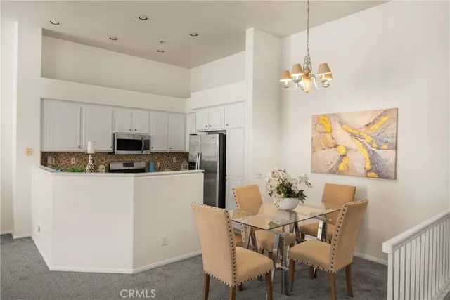 a view of front door of house with balcony