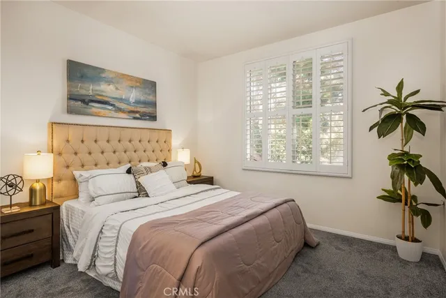 a kitchen with appliances a sink and cabinets